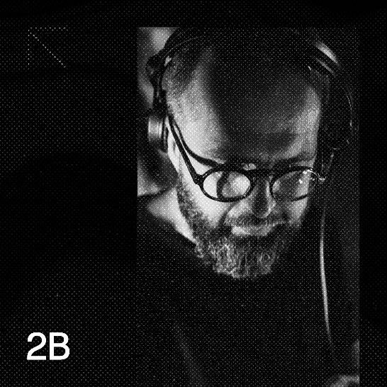 DJ 2B in headphones