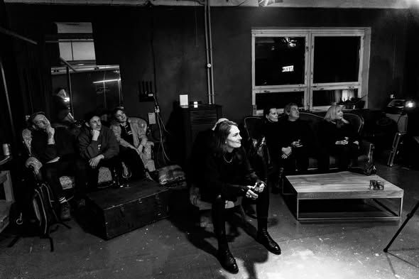 Studio audience on sofas during the broadcast